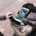 Amylove 2 Pcs Stroller Phone Holder Portable Cell Phone Holder Stand Universal Stroller Accessories for Parent Baby Toddler Phone Clamp with Non Slip Silicone Arm Grip for Shopping Carts (Black, Grey) - Image 3